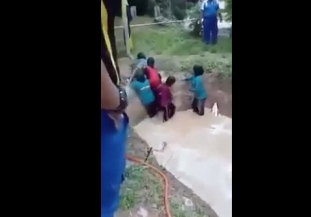 Screaming children forced into snake pit in 'team-building exercise'