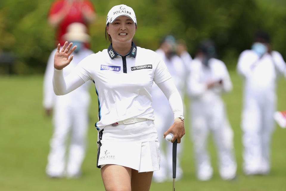 Jin Young Ko of South Korea celebrates winning the Women's World Championship golf tournament at Sentosa Golf Club in Singapore, Sunday, March 6, 2022. (AP Photo/Paul Miller)