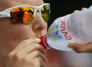 Kirsten Flipkens of Belgium has a drink of water during her match against Annika Beck of Germany on the first day at the Wimbledon Tennis Championships in London, June 29, 2015. REUTERS/Suzanne Plunkett