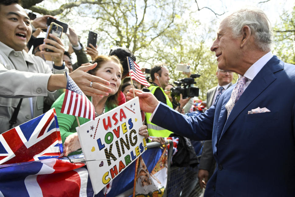 Britain's King Charles III greets well-wishers outside Buckingham Palace, in London, May 5, 2023, a day before his coronation at Westminster Abbey. / Credit: Toby Melville/AP