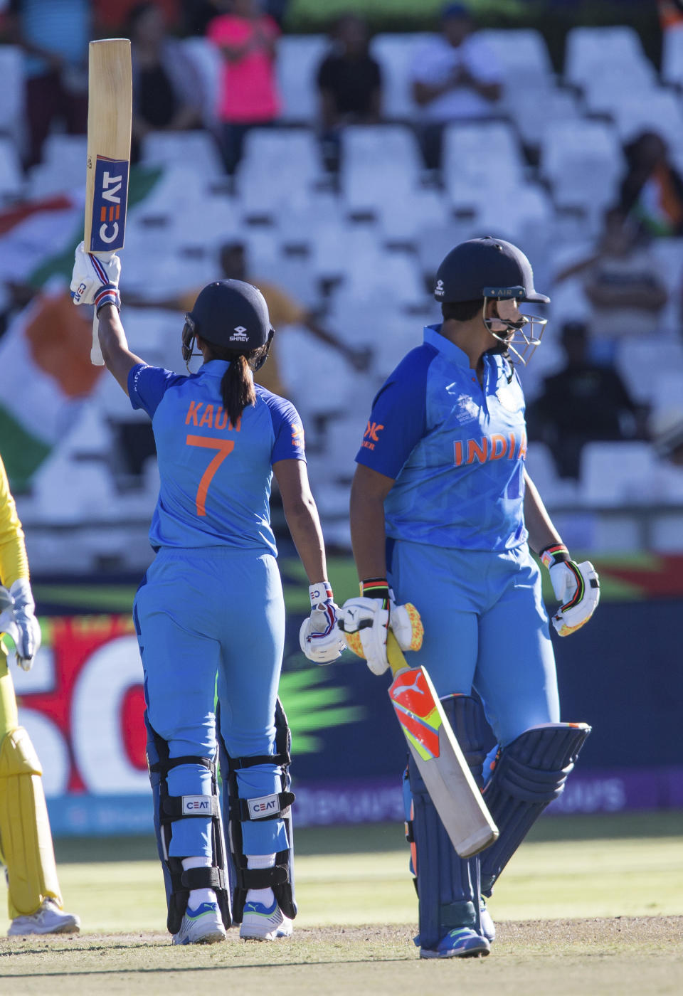 India's Harmanpreet Kaur celebrates her 50 against Australia during the Women's T20 World Cup semi final cricket match in Cape Town, South Africa, Thursday Feb. 23, 2023. (AP Photo/Halden Krog)