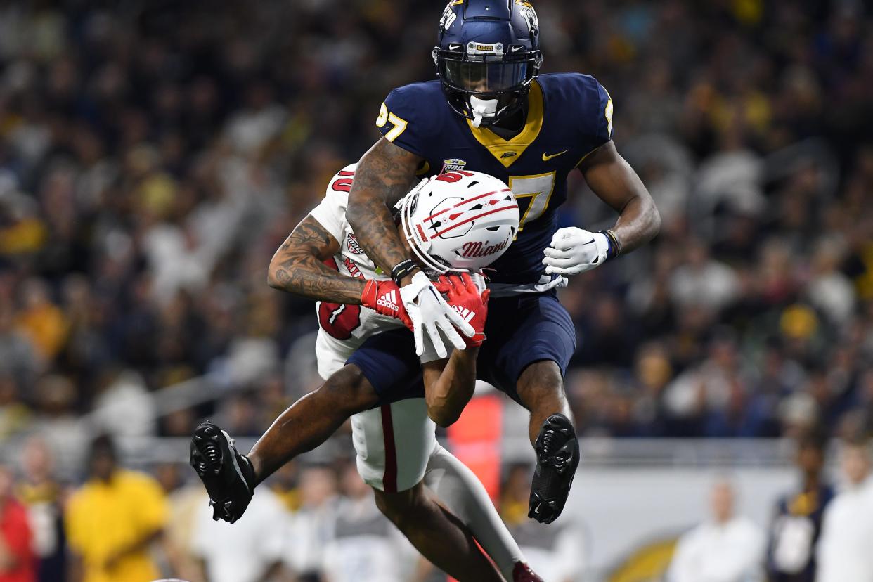 Toledo Rockets cornerback Quinyon Mitchell breaks up a pass intended for Miami receiver Gage Larvadain in the third quarter at Ford Field, Dec. 2, 2023 in Detroit.