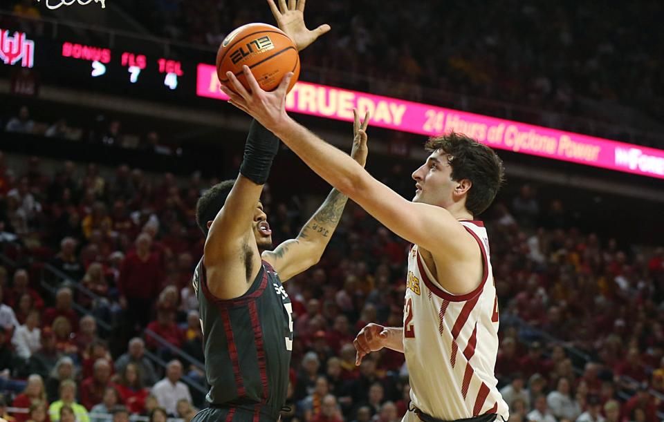 Iowa State Cyclones forward Milan Momcilovic (22) goes for layup as Oklahoma Sooners guard Rivaldo Soares (5) attempts top block during the first half in the Big-12 conference showdown at Hilton Coliseum on Wednesday, Feb. 28, 2024, in Ames, Iowa.