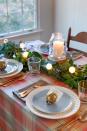 <p>A classic tartan tablecloth <a href="https://www.countryliving.com/diy-crafts/g2781/country-christmas-decorations/" rel="nofollow noopener" target="_blank" data-ylk="slk:dresses up a space;elm:context_link;itc:0;sec:content-canvas" class="link ">dresses up a space</a> in a polished (but not at all pretentious) way. For a whimsical place setting, slide good old handwritten namecards into the slots of vintage sleigh bells (we found these on eBay) and give new meaning to "be there with bells on." </p><p><a class="link " href="https://www.amazon.com/Jingle-Ornaments-3-35-inch-Diameter-6-Pack/dp/B08CWDCZR7/ref=sr_1_4?tag=syn-yahoo-20&ascsubtag=%5Bartid%7C10050.g.644%5Bsrc%7Cyahoo-us" rel="nofollow noopener" target="_blank" data-ylk="slk:Shop Now;elm:context_link;itc:0;sec:content-canvas">Shop Now</a></p>