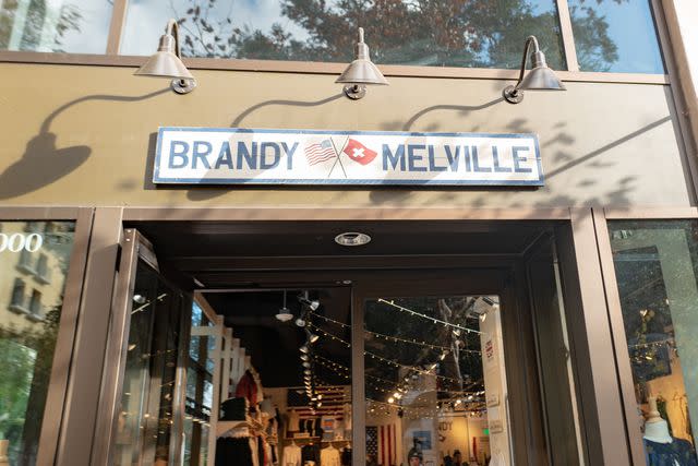 <p>Smith Collection/Gado/Getty</p> Sign on facade at retail store Brandy Melville on Santana Row in the Silicon Valley, San Jose, California, December 14, 2019.
