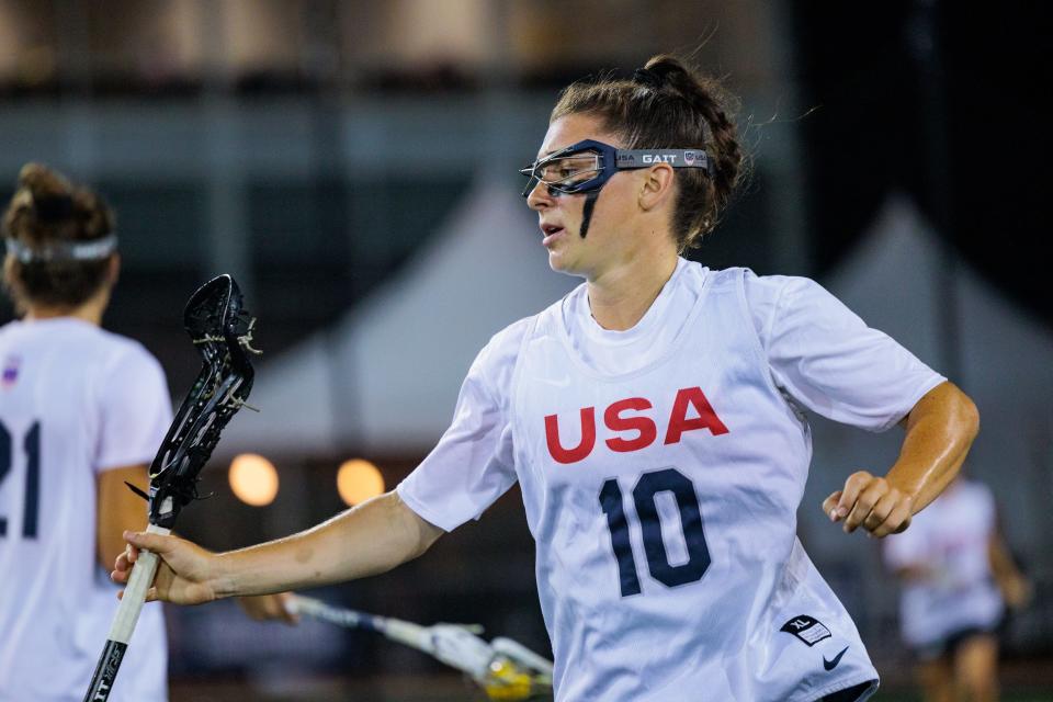 Charlotte North competes for Team USA at the 2022 World Lacrosse Women's World Championship.