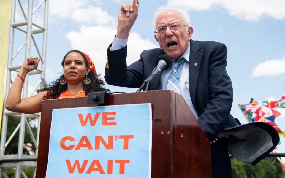 Bernie Sanders addressed a rally in Washington on Thursday, calling for spending on climate change and jobs - GETTY IMAGES