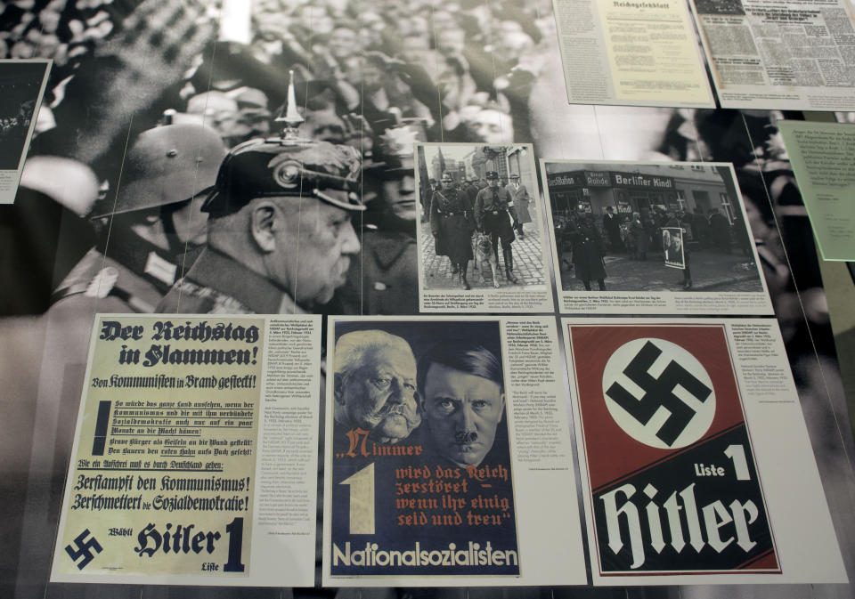 A poster, front center, showing Adolf Hitler, right, and German President Paul von Hindenburg, left, is pictured at the 'Berlin 1933 - the way to despotism' exhibition at the Topography of Terror museum in Berlin, Germany, Wednesday, Jan. 30, 2013. (AP Photo/Michael Sohn)  <em><strong>CORRECTION:</strong> An earlier version of this slide indicated that Paul von Hindenburg was Reich Chancellor. He was President of Germany.</em>
