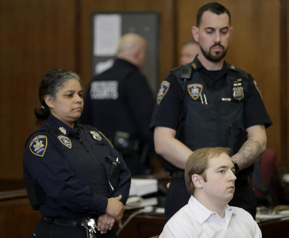 James Jackson appears in court for sentencing in New York, Wednesday, Feb. 13, 2019. Jackson, a white supremacist, pled guilty to killing a black man with a sword as part of a racist plot that prosecutors described as a hate crime and was sentenced to life in prison without parole. (AP Photo/Seth Wenig)