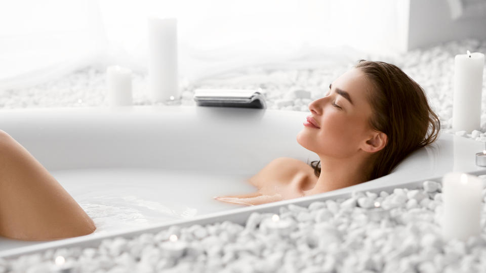 Wellness And Relax Concept. Woman Resting In Bath After Work Day