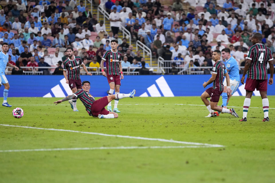 Manchester City's Julian Alvarez, 2nd right, scores his side's fourth goal during the Soccer Club World Cup final match between Manchester City FC and Fluminense FC at King Abdullah Sports City Stadium in Jeddah, Saudi Arabia, Friday, Dec. 22, 2023. (AP Photo/Manu Fernandez)