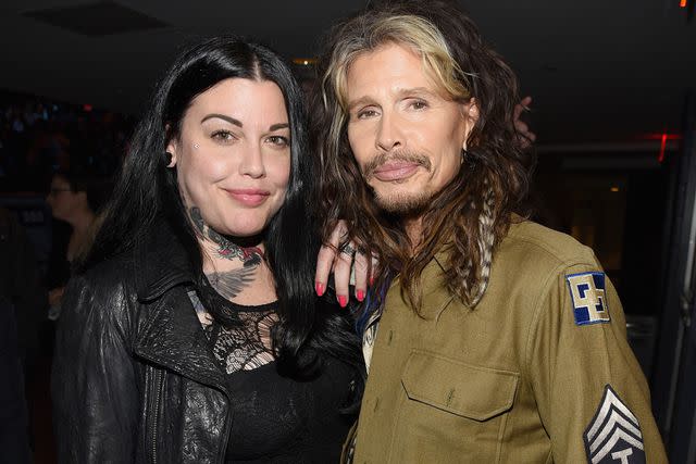 <p>Kevin Mazur/Getty </p> Mia Tyler, pictured with her father Steven Tyler, urged her followers to donate to help the people of Maui.