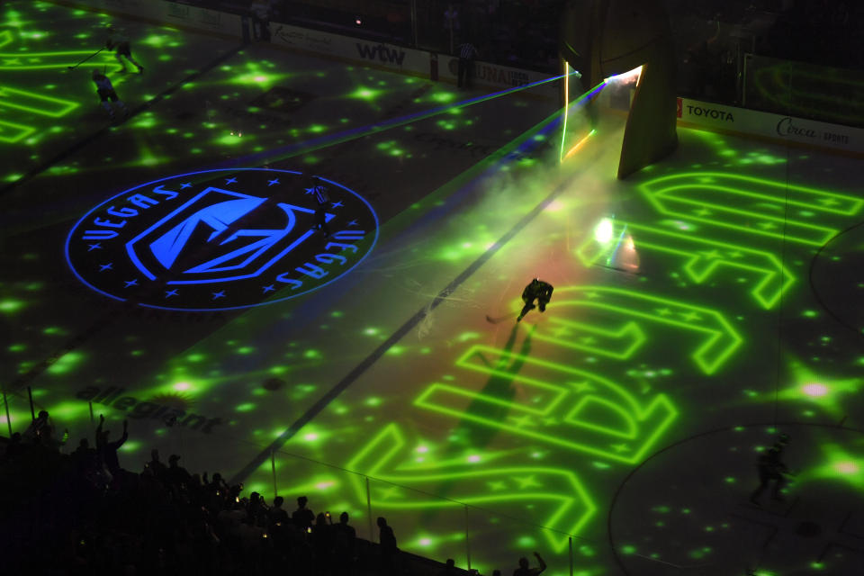 The Vegas Golden Knights take the ice before an NHL hockey game against the Nashville Predators at T-Mobile Arena Saturday, Dec. 31, 2022, in Las Vegas. (AP Photo/David Becker)