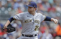 Milwaukee Brewers pitcher Brett Anderson works against the Atlanta Braves during the first inning of a baseball game Sunday, Aug. 1, 2021, in Atlanta. (AP Photo/Ben Margot)