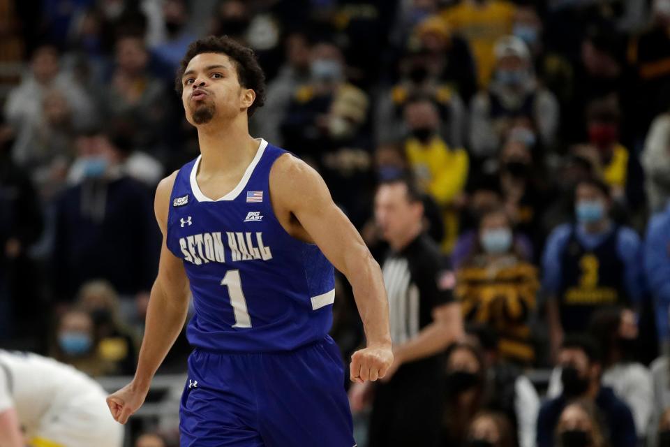 Seton Hall's Bryce Aiken reacts after making a shot during the first half of an NCAA college basketball game against Marquette, Saturday, Jan. 15, 2022, in Milwaukee. (AP Photo/Aaron Gash)