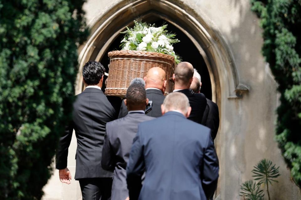 The coffin is carried into the church by pallbearers during the funeral of Dame Deborah James (Getty Images)