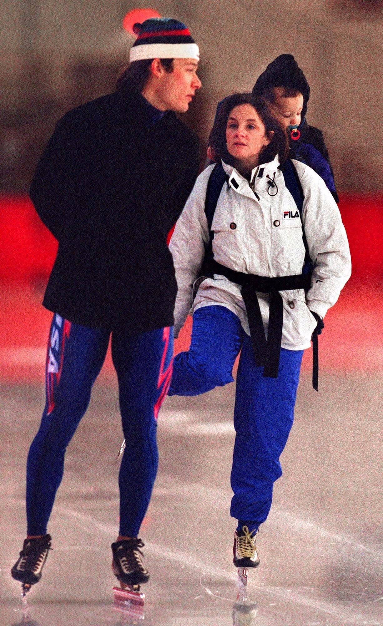 Five-time Olympic gold medalist Bonnie Blair skates with her husband, Dave Cruikshank and son, Grant B. Cruikshank, 1, at the Pettit National Ice Center on  Feb. 1, 2000. Cruikshank was practicing for the World Speed Skating Championships.