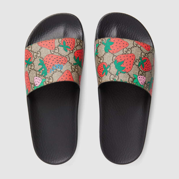 GG Gucci strawberry slide sandal, $310, <a href="https://www.gucci.com/us/en/pr/women/womens-shoes/womens-slides-thongs/gg-gucci-strawberry-slide-sandal-p-408508G22008919?position=31&listName=ProductGrid&categoryPath=Women/Womens-Shoes/Womens-Slides-Thongs" rel="nofollow noopener" target="_blank" data-ylk="slk:available here;elm:context_link;itc:0;sec:content-canvas" class="link ">available here</a>. Photo: Courtesy of Gucci
