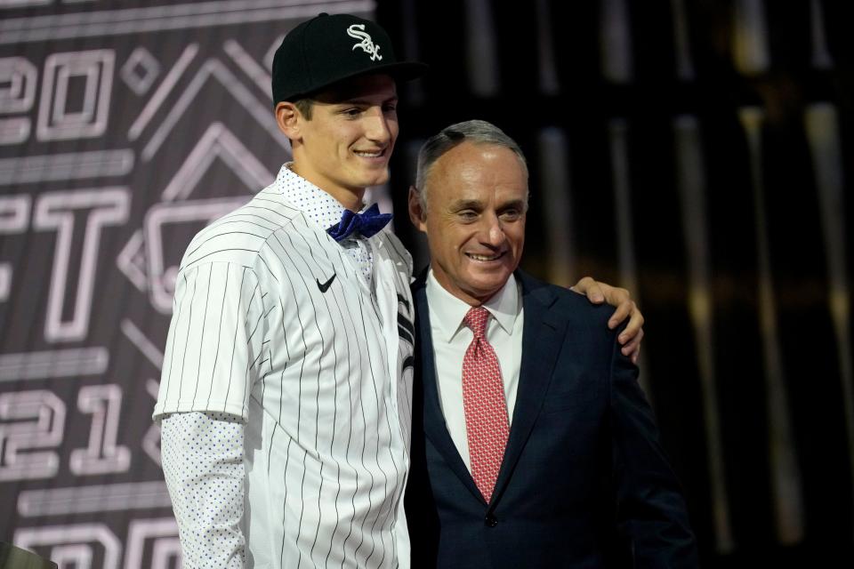 Southridge High School's Colson Montgomery poses with MLB commissioner Rob Manfred after he was made a first-round pick of the Chicago White Sox in the MLB amateur free agent draft on July 11 in Denver.