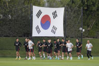 South Korean players warm up during a training session at Al Egla Training Site 5 in Doha, Qatar, Friday, Nov. 25, 2022. South Korea will play its second match in Group H in the World Cup against Ghana on Nov. 28. (AP Photo/Lee Jin-man)