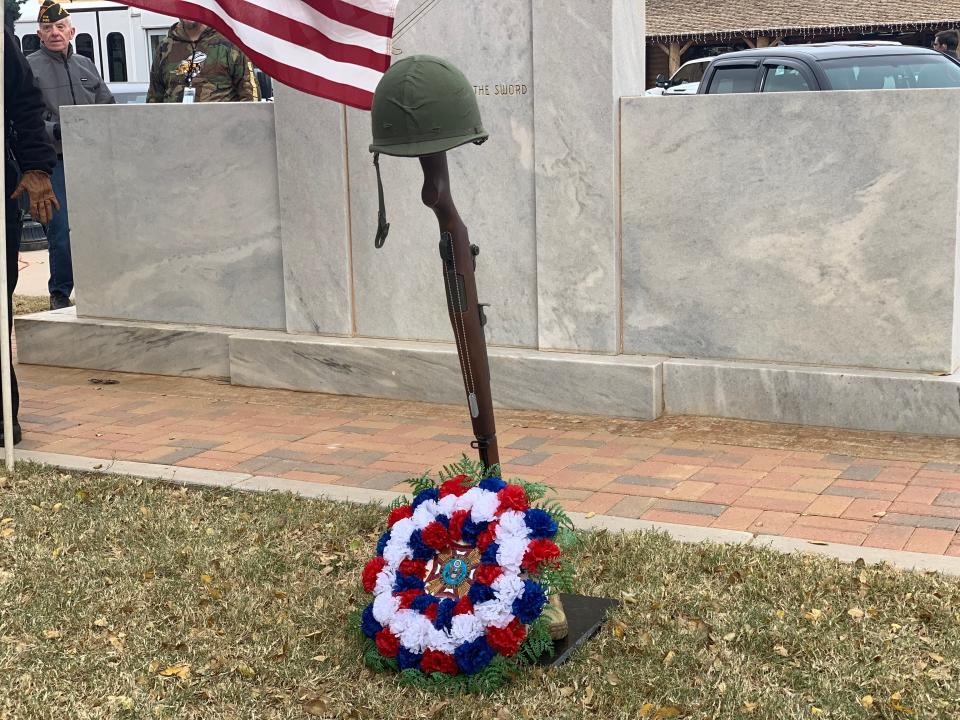 The ceremony also included a 21-gun salute, TAPS and WWII veterans laid the wreath at the monument honoring the fallen.