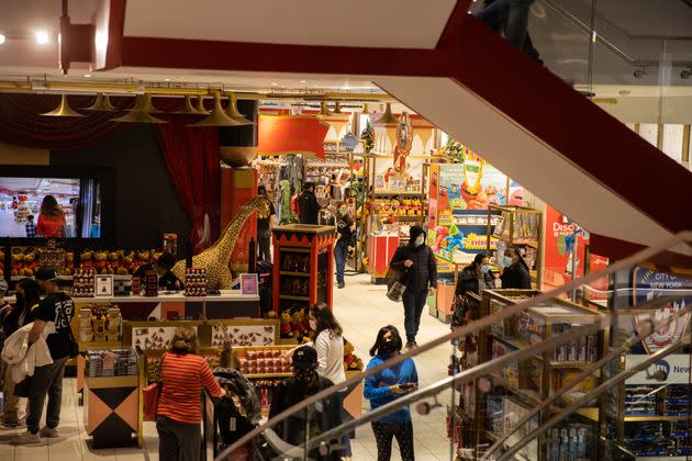 NEW YORK, NY - NOVEMBER 27: Customers wearing protective masks shop at FAO Schwarz on November 27, 2020 in New York, United States. Shoppers go out early despite ongoing concerns and limitations due to COVID-19 this year. (Photo by Jeenah Moon/Getty Images) (Photo: Jeenah Moon via Getty Images)