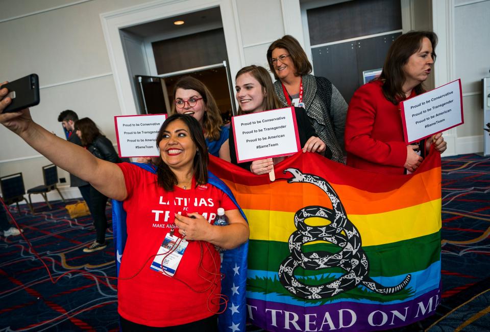 <p>Teresa Mendoza (L) takes a selfie with transgender attendees to the 45th annual Conservative Political Action Conference (CPAC) at the Gaylord National Resort & Convention Center in National Harbor, Md., Feb. 23 2018. (Photo: Jim Lo Scalzo/EPA-EFE/REX/Shutterstock) </p>