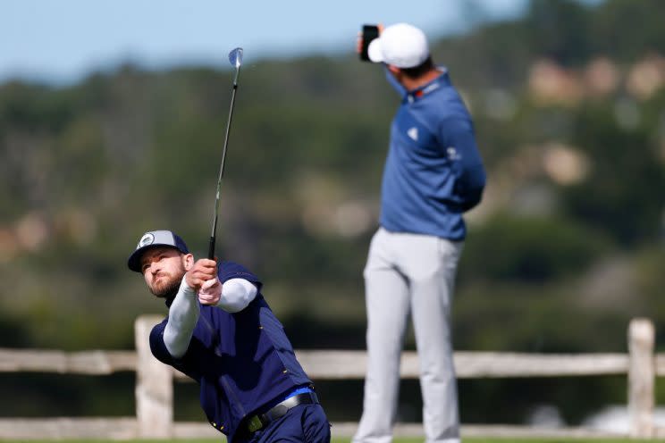 PEBBLE BEACH, CA – FEBRUARY 11: Justin Rose takes a photo of Justin Timberlake as he just misses a hole-in-one on the seventh hole during Round Three of the AT&T Pebble Beach Pro-Am at Pebble Beach Golf Links on February 11, 2017 in Pebble Beach, California. (Photo by Jonathan Ferrey/Getty Images)