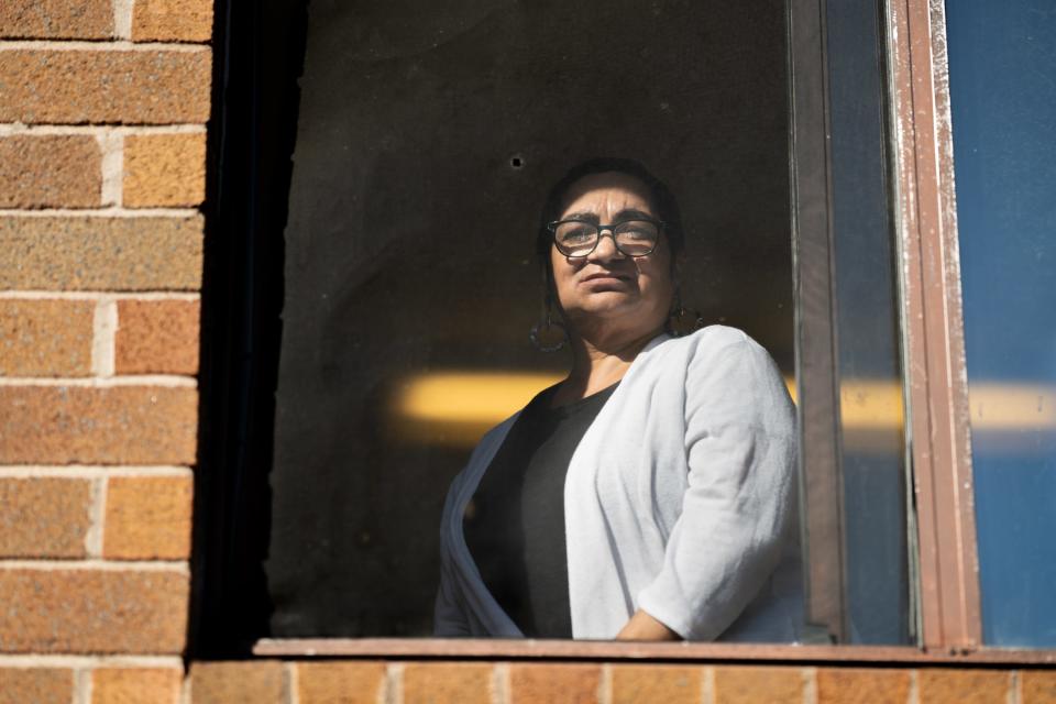 Zoraida Diaz, 60, stands in her Manchester, Conn., home on Tuesday. Diaz has received treatment for anxiety and depression at Community Health Resources in town. She is also in recovery from colon cancer and addiction.