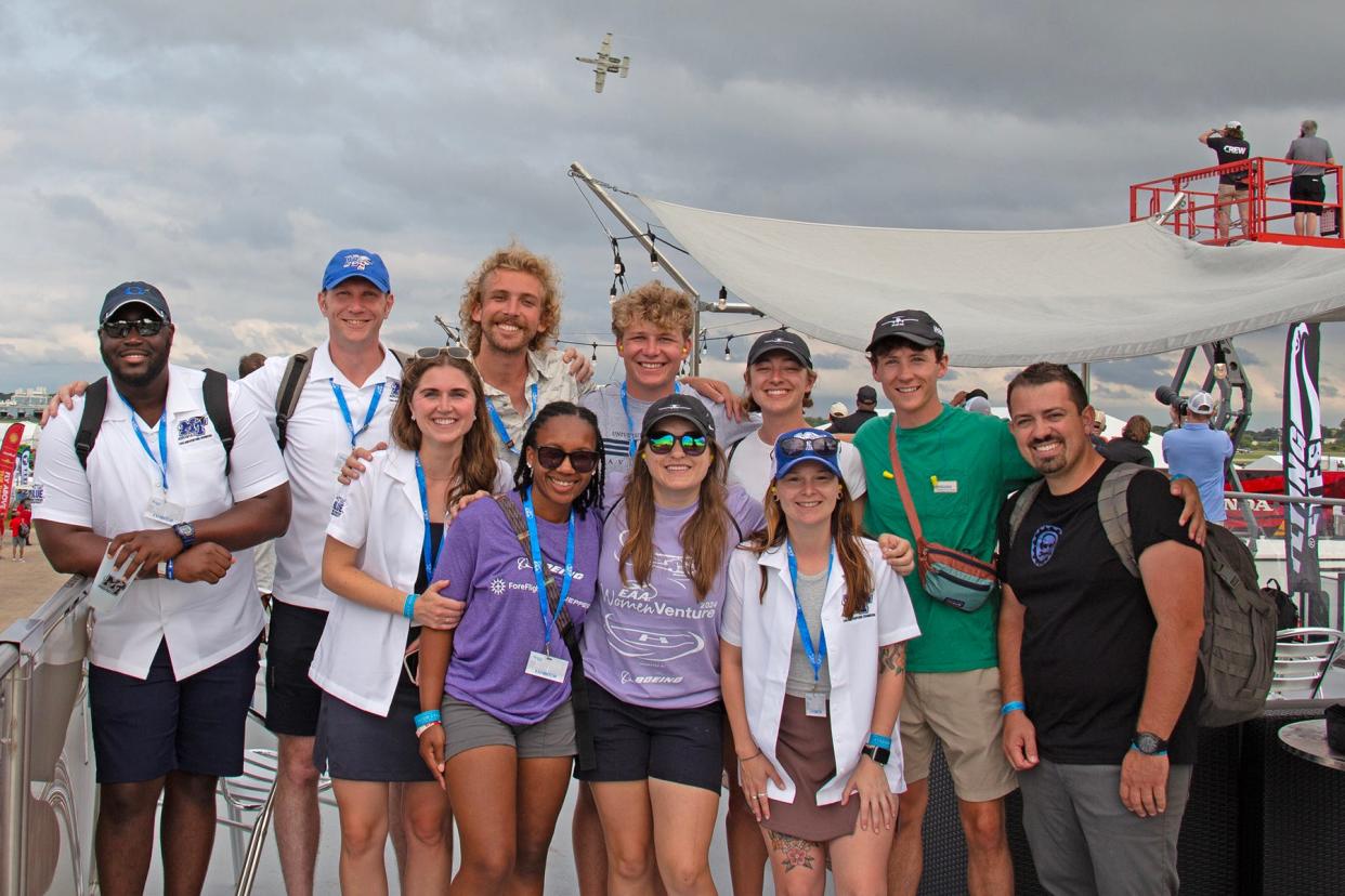 Students and flight instructors from Middle Tennessee State University Aerospace Pro Pilot program pose for a group photo at Tuesday’s airshow at the 2024 EAA AirVenture, held annually in Oshkosh, Wisconsin.