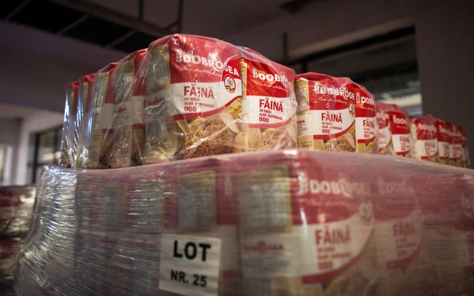 Packets of flour in a flour mill and bread factory in Constanta, Romania. Global supplies are under pressure as the war in Ukraine drags on - Nathan Laine/Bloomberg