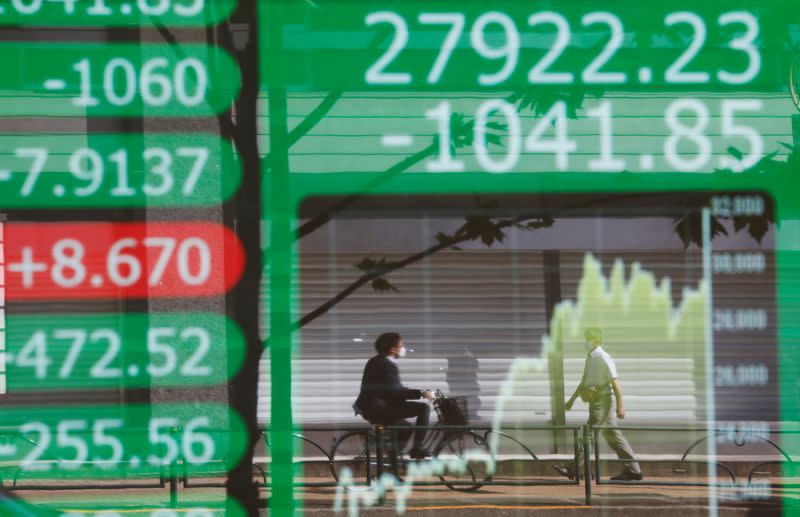 FILE PHOTO: Asian stocks drop as Fed shift reverberates