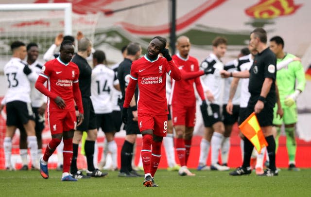 Liverpool players are dejected at full-time