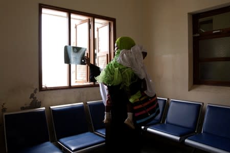 The Wider Image: Tanzania's Zanzibar begins to register traditional healers