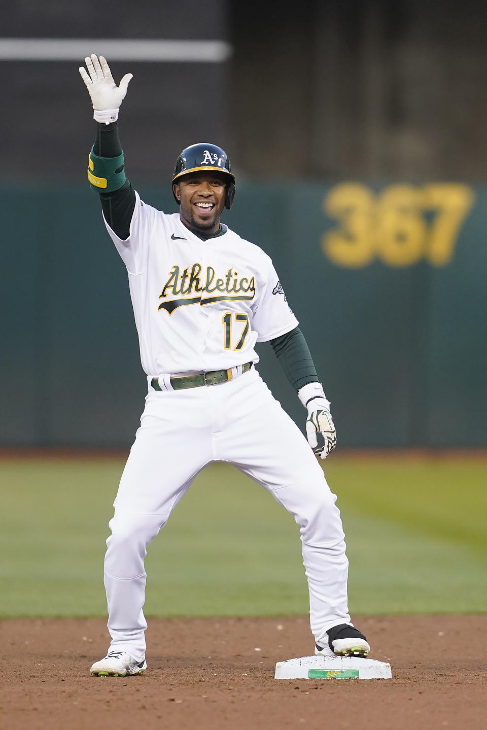 Oakland Athletics' Elvis Andrus reacts after hitting an RBI-double against the Minnesota Twins during the fourth inning of a baseball game in Oakland, Calif., Monday, May 16, 2022. (AP Photo/Jeff Chiu)