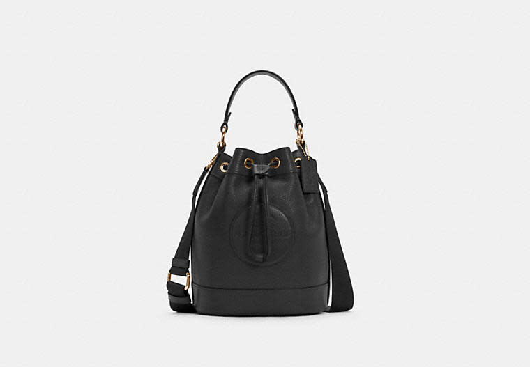 Dempsey Drawstring Bucket Bag. Image via Coach Outlet.