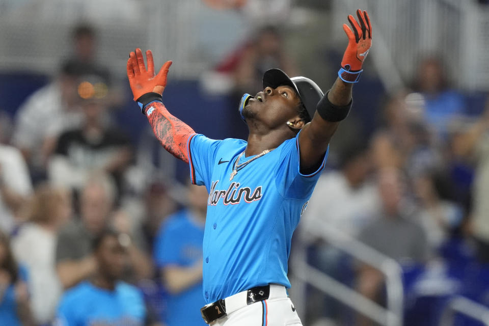 Miami Marlins' Jazz Chisholm Jr. reacts after hitting a solo home run during the fourth inning of a baseball game against the Cleveland Guardians, Sunday, June 9, 2024, in Miami. (AP Photo/Lynne Sladky)