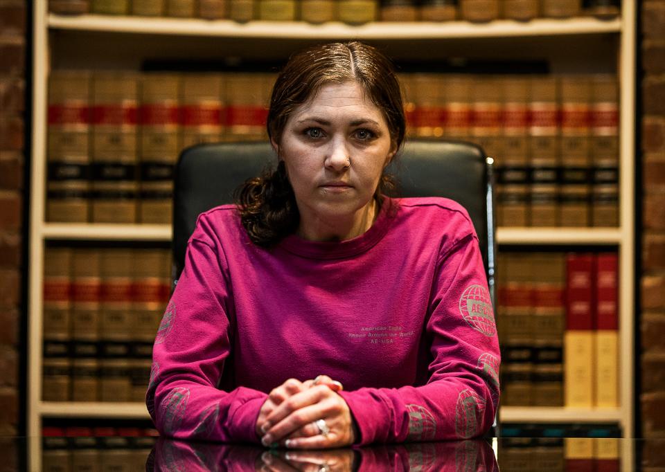 Amber Burgess sits in the office of her lawyer in downtown Louisville. Burgess has a lawsuit pending that alleges she was left paralyzed after a routine visit to a chiropractor in May of 2020.