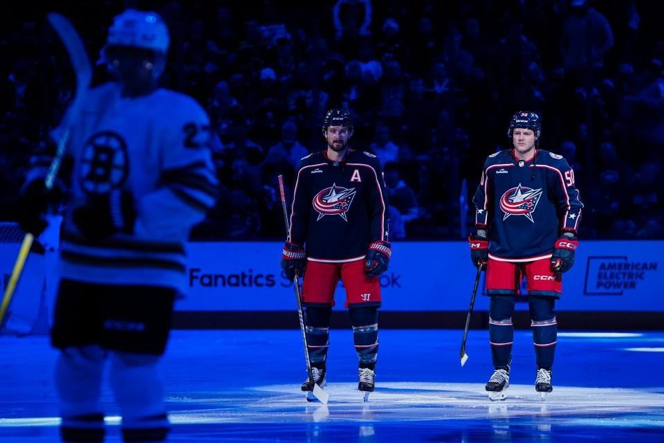 Nov 27, 2023; Columbus, Ohio, USA; Columbus Blue Jackets left wing Eric Robinson (50) and center Sean Kuraly (7) are introduced prior to the first period of the NHL game against the Boston Bruins at Nationwide Arena.
