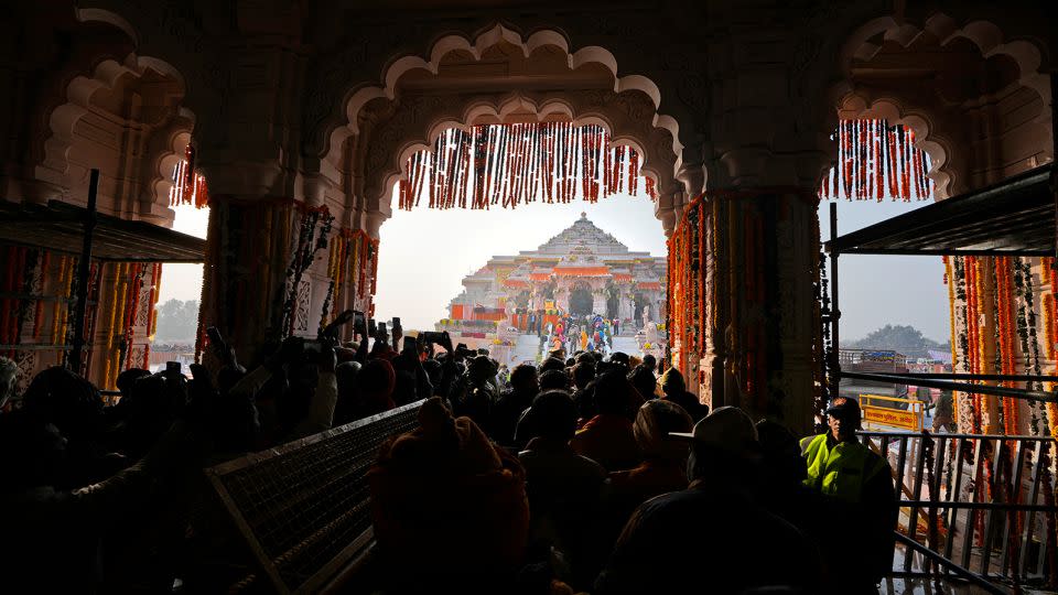 Devotees wait in a long queue to enter the newly opened Lord Ram temple, in Ayodhya, India, Tuesday, January 23, 2024. - Rajesh Kumar Singh/AP