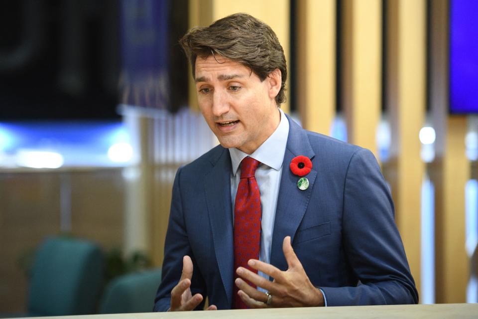 Canadian Prime Minister Justin Trudeau gestures while holding a meeting with US businessman Michael Bloomberg (not pictured) on day two of the COP26 UN Climate Change Conference in Glasgow, Scotland on November 1, 2021. - COP26, running from October 31 to November 12 in Glasgow will be the biggest climate conference since the 2015 Paris summit and is seen as crucial in setting worldwide emission targets to slow global warming, as well as firming up other key commitments. (Photo by Oli SCARFF / AFP) (Photo by OLI SCARFF/AFP via Getty Images)