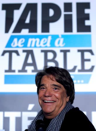 French businessman Bernard Tapie attends a news conference, in this picture taken March 12, 2014, for the launching of his web TV at the headquarters of the French daily newspaper 'La Provence' in Marseille, France. REUTERS/Jean-Paul Pelissier/Files