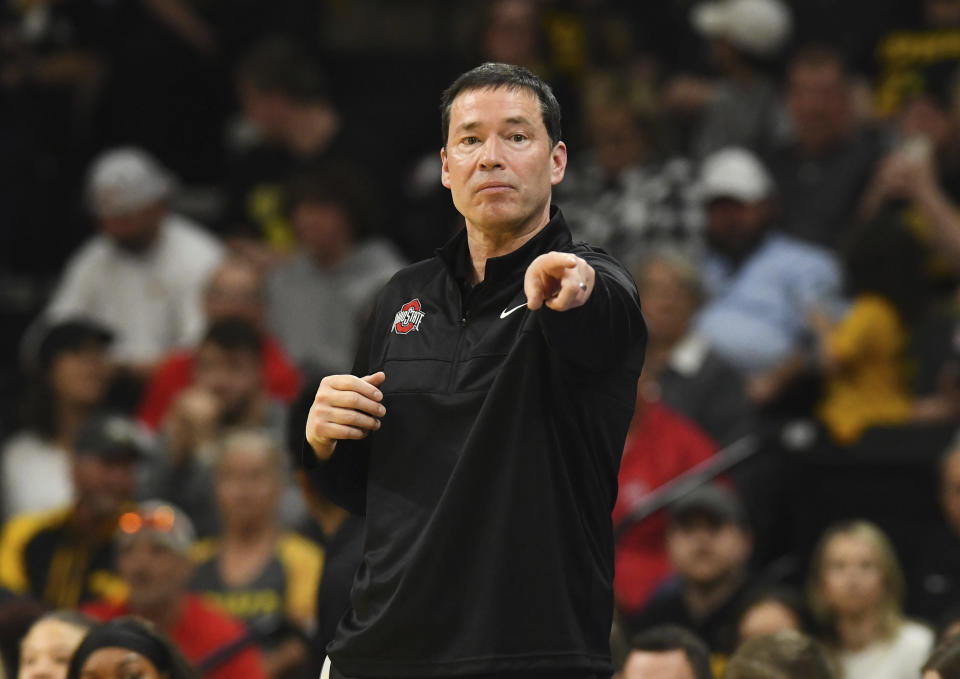 Ohio State head women's basketball coach Kevin McGuff gestures to his players as they face Iowa during the second half of an NCAA college basketball game, Sunday, March 3, 2024, in Iowa City, Iowa. (AP Photo/Cliff Jette)