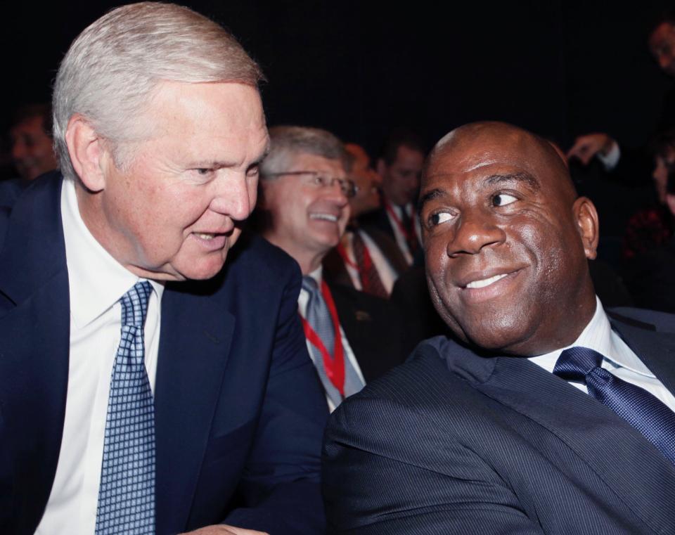 Deep ties between Jerry West and Magic Johnson don't mean West doesn't enjoy getting the best of his rival. (AP)