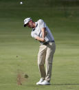 Andrew Putnam hits from the 10th fairway during the first round of the Sony Open PGA Tour golf event, Thursday, Jan. 10, 2019, at the Waialae Country Club in Honolulu, Hawaii. (AP Photo/Matt York)