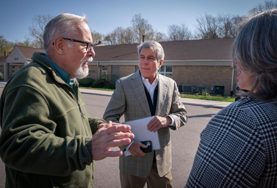 Bob Muller, left, president of the Royal Oak Nature Society speaks to John Erb (son of the late Fred Erb), and Tara Toumaala, the program officer for the Erb Foundation before the Erb family honor the late philanthropic Fred Erb on what would have been his 100th birthday by planting 100 trees around the newly named in his name, Fred A. Erb Arboretum in Royal Oak on April 27, 2023. There was a groundbreaking and press event that also hosted Addams Elementary third graders who helped participate.