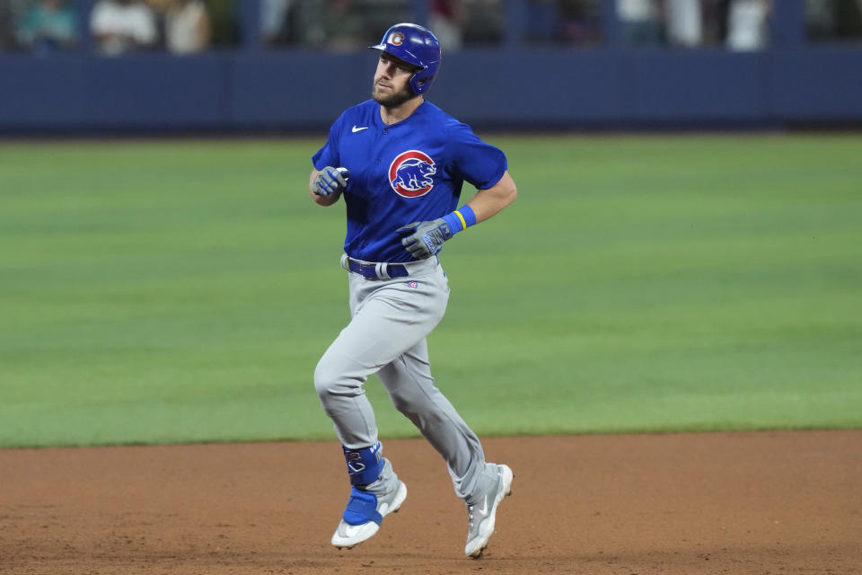 Chicago Cubs' Patrick Wisdom (16) runs the bases after hitting a home run in the second inning of a baseball game against the Miami Marlins, Saturday, April 29, 2023, in Miami. (AP Photo/Marta Lavandier)