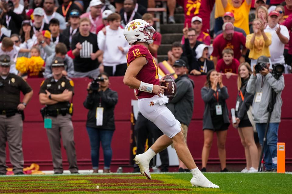 Iowa State quarterback Hunter Dekkers (12) runs for a touchdown during Saturday's game vs. Ohio at Jack Trice Stadium in Ames.