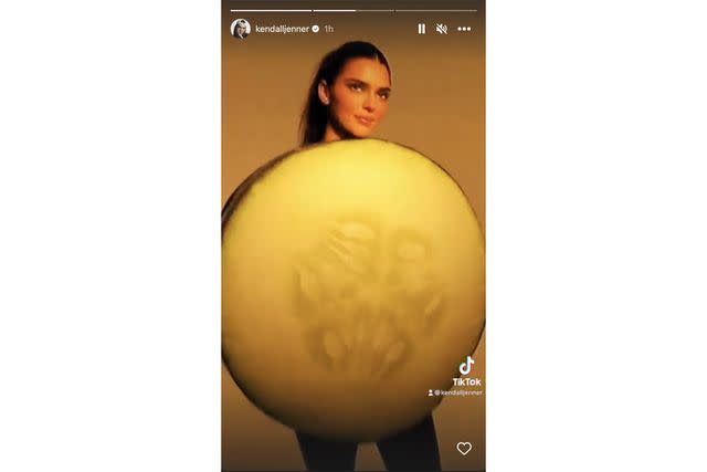 kendall jenner/Instagram Kendall Jenner wears a cucumber costume in a 2022 TikTok.