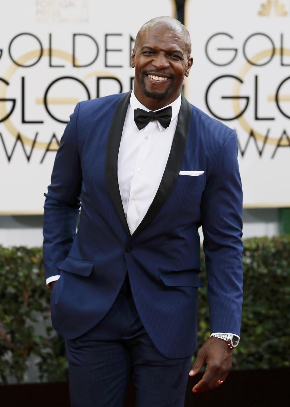 Terry Crews arrives at the 71st annual Golden Globe Awards in Beverly Hills